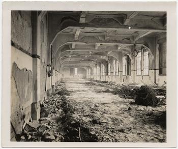 [Complete destruction of wooden floor and telephone switch and relay racks of Hiroshima Telephone Company, Central District Exchange], October 28, 1945.